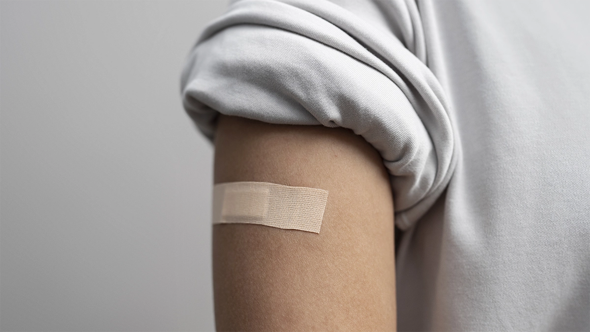 hand wearing band-aid and Essential Oils in Antibacterial Wound Care