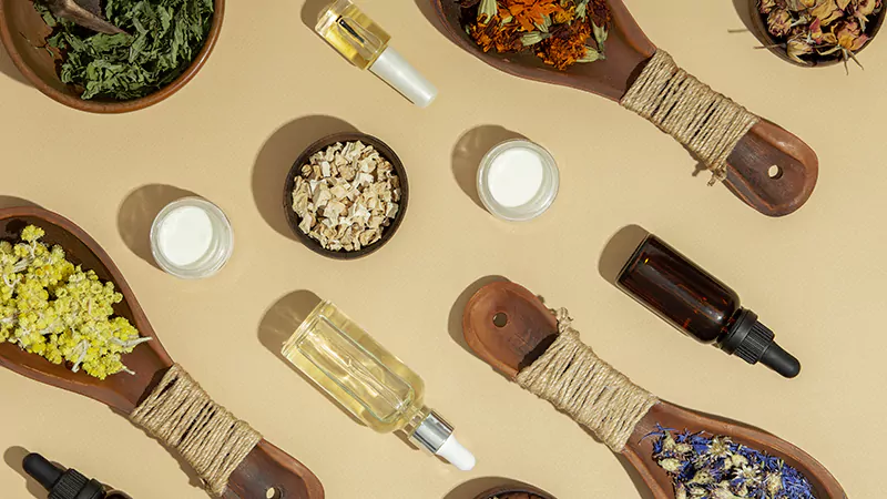 photo lot of herbal medicine and essential oils lay on the table