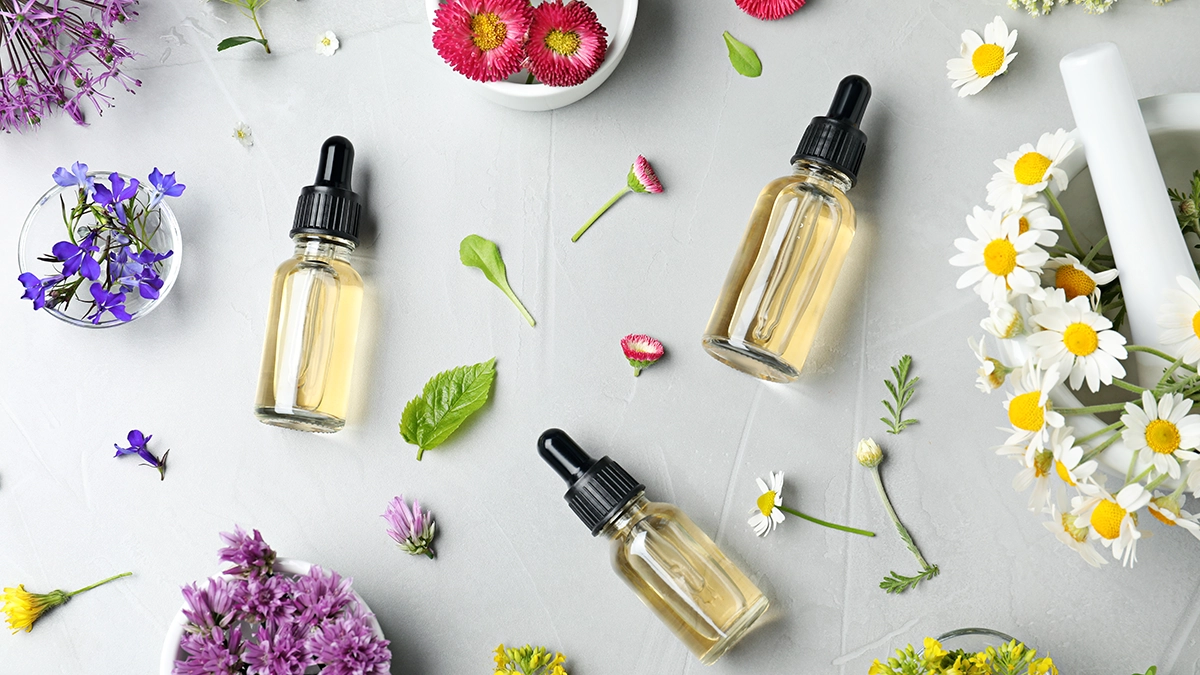Bottles of various essential oils and natural ingredients