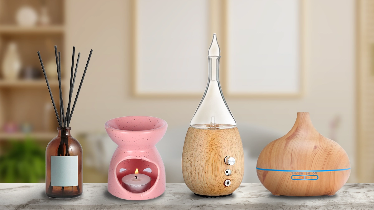 A variety of stylish essential oil diffusers on a shelf comparing different types of essential oil diffusers