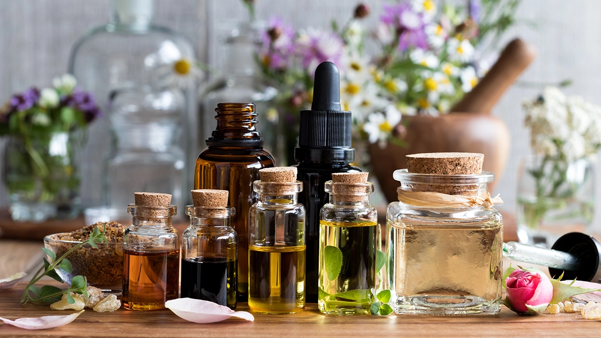 various essential oil bottles with natural elements
